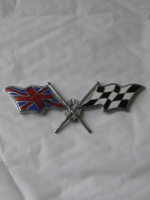 Click the image for more info 1960's LES LESTON CROSSED FLAGS CAR BADGE 1960's